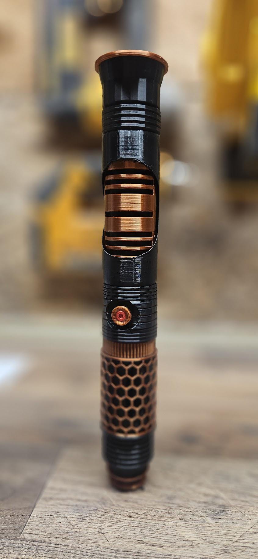 The Warden Light up collapsible lightsaber!