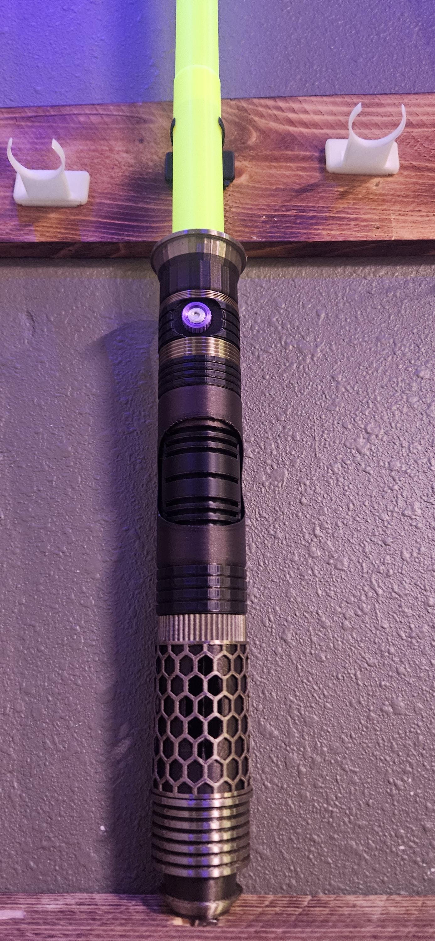 The Warden Light up collapsible lightsaber!