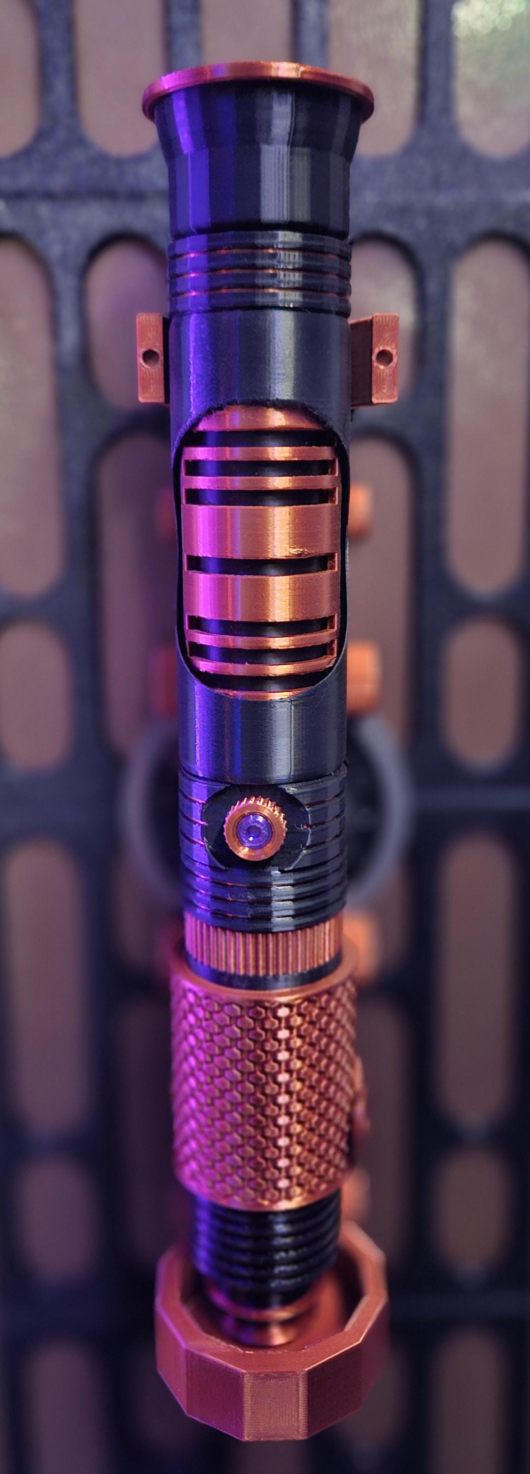 The Warden Light up collapsible lightsaber!