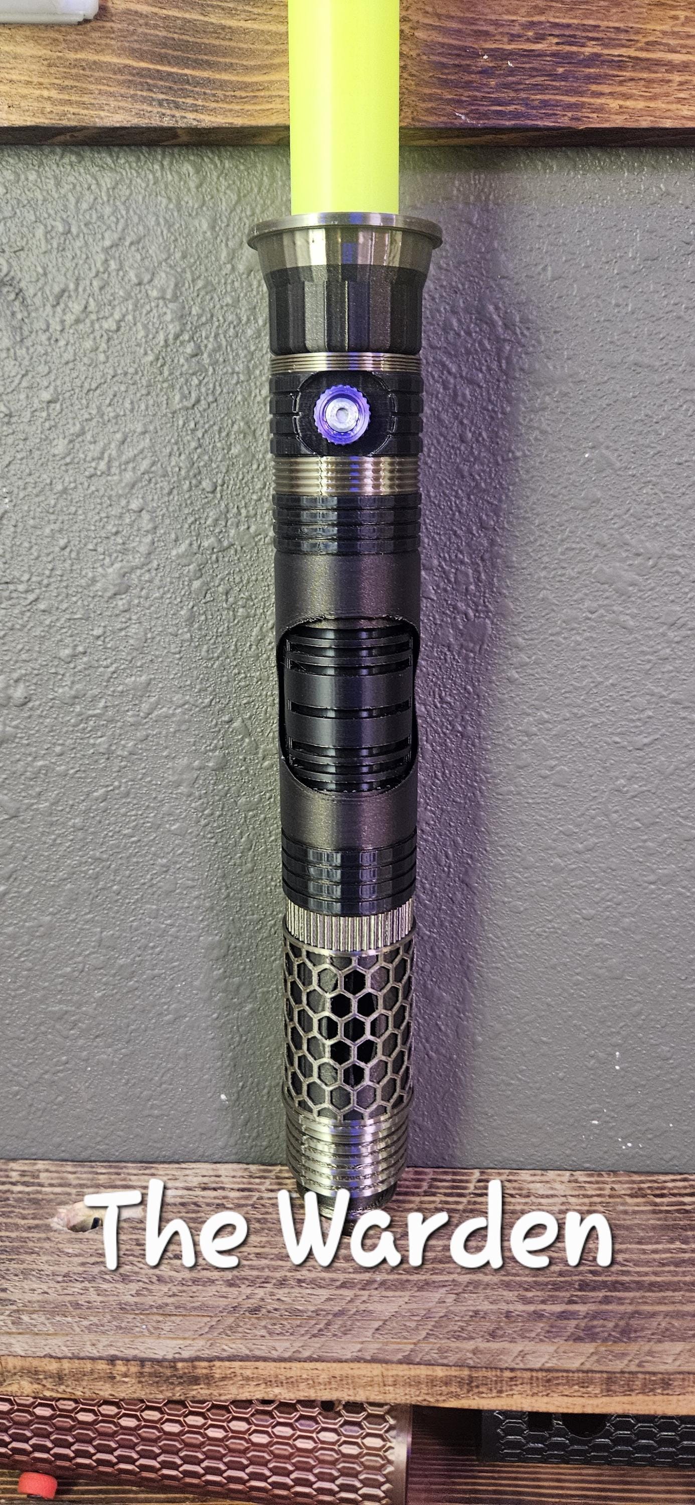 The Warden Light up collapsible lightsaber!